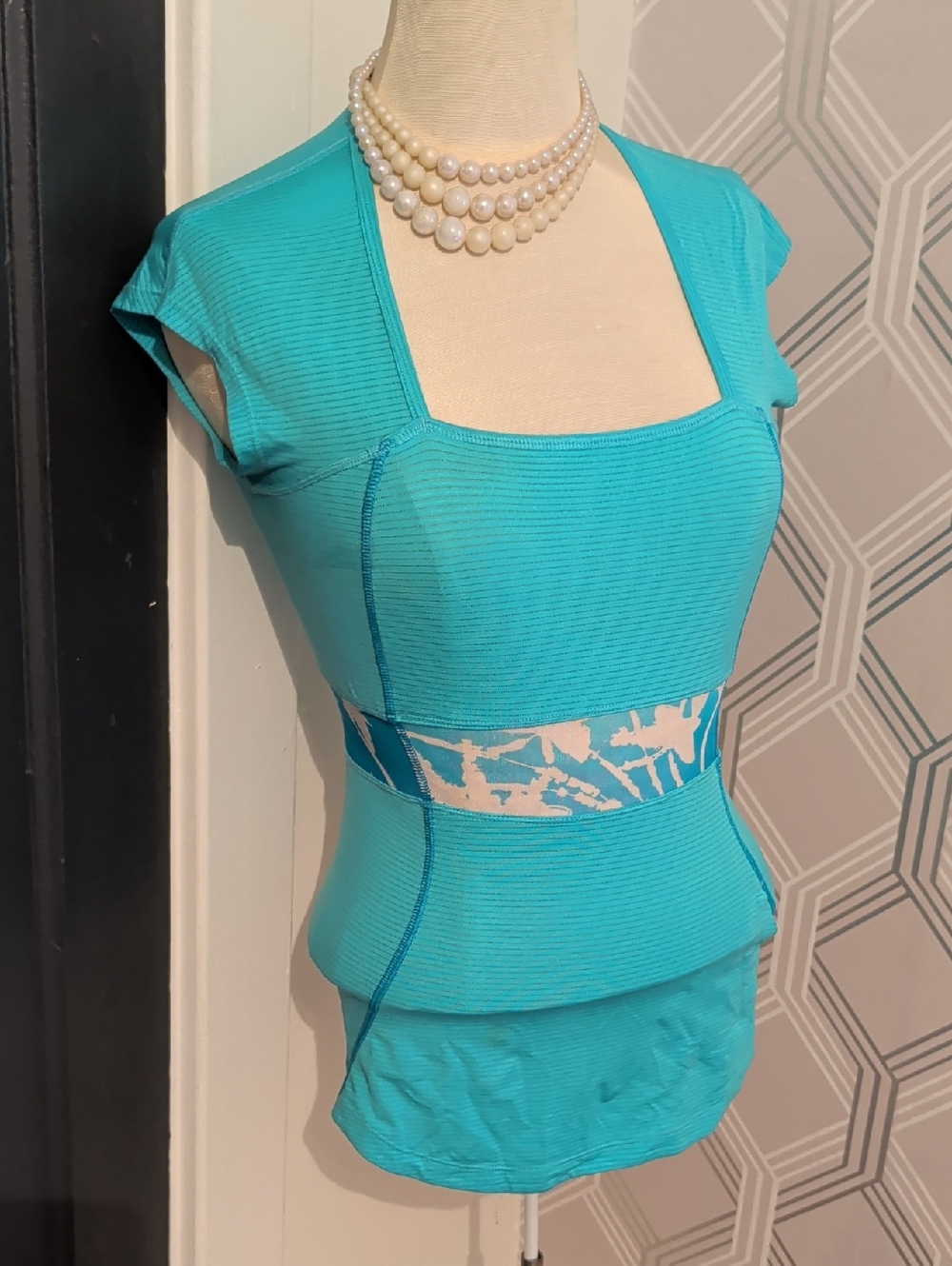 lululemon teal striped athletic tank with subtle logo